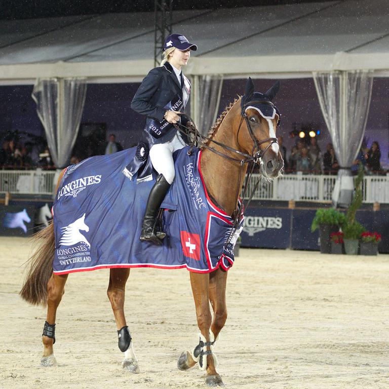 Barron et sa cavalière Lucy Davis pendant le tour d'honneur de l'épreuve du Longines Global Champions Tour à Lausanne en 2013. - CC BY-SA 3.0 - Clément Bucco-Lechat